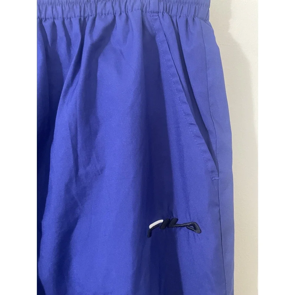 Vintage 90's FILA Baggy Fit Windbreaker Track Sweat Pants Size‎ M Blue Lined